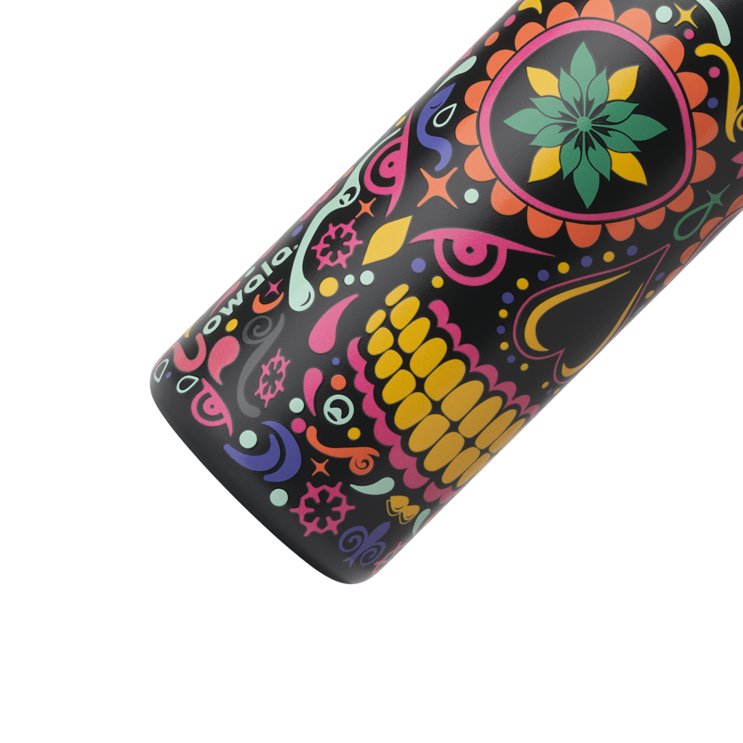 Owala FreeSip Sway 32oz in Sugar Skull, black body with colorful sugar-skull pattern in pink, green, orange, yellow, and purple, white Owala logo; glows in the dark