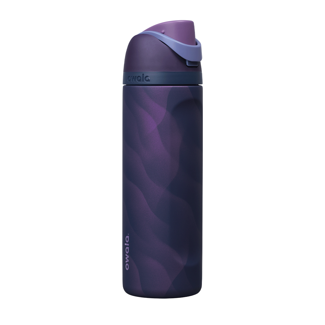 Owala FreeSip 24oz in Arctic Storm, exploded view showing the deep purple body, navy lid with periwinkle carry loop, deep purple flip cap with periwinkle FreeSip spout, and lavender silicone straw